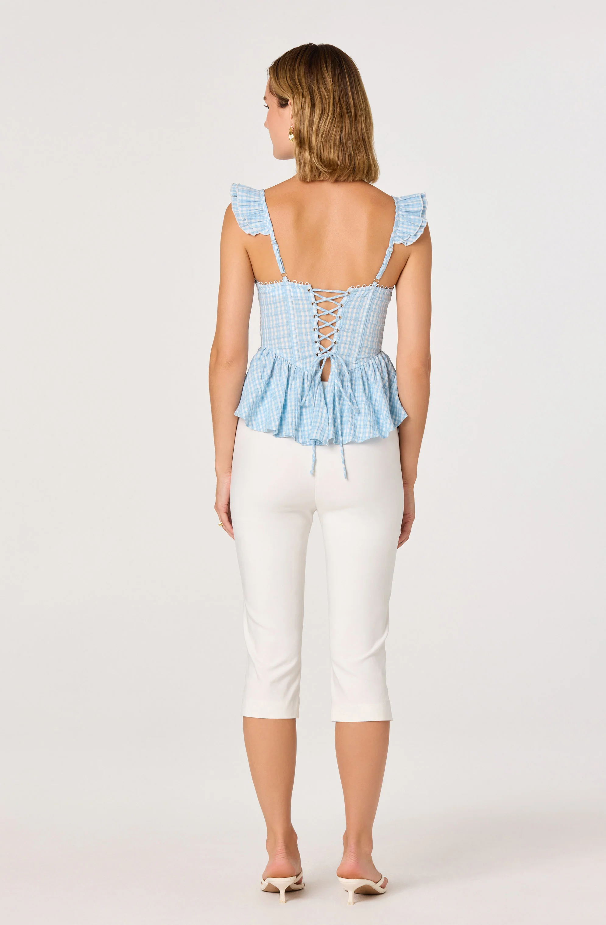 Baylin Eyelet Corset Peplum Top - Image 9