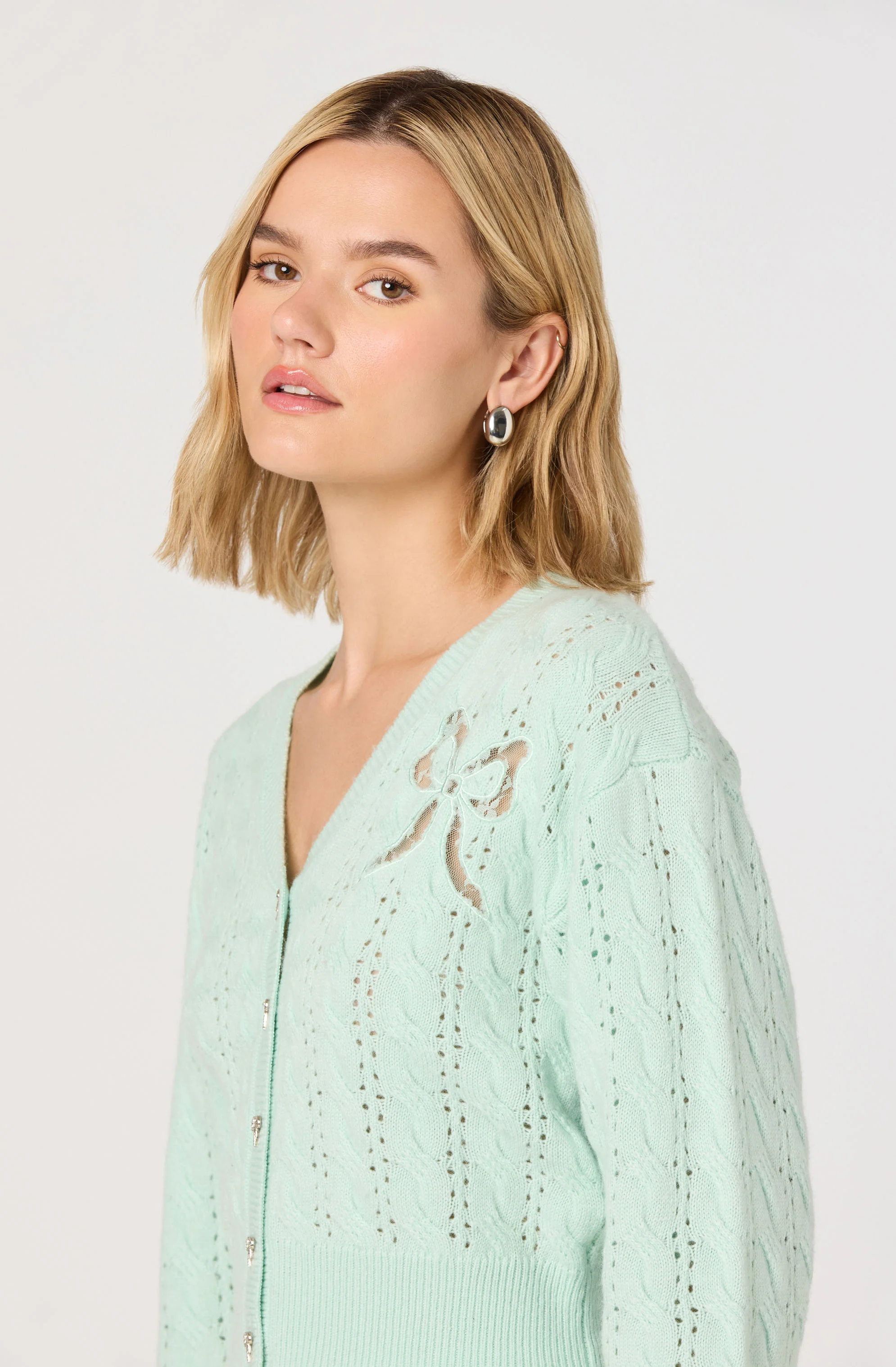 Kalen Cable-Knit Bow Cutout Cardigan - Image 5